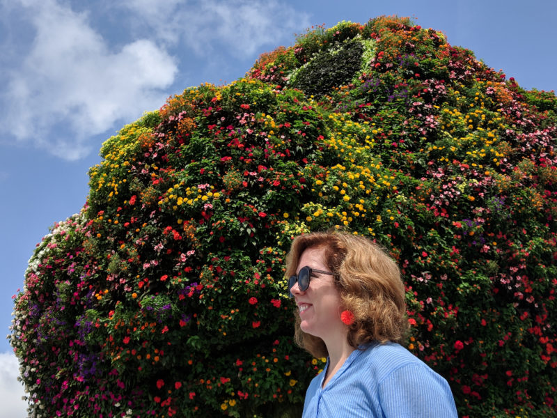 Karyn Miller in front of a large tree