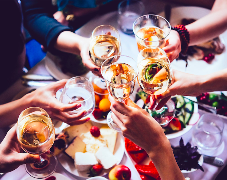 People toasting with wine