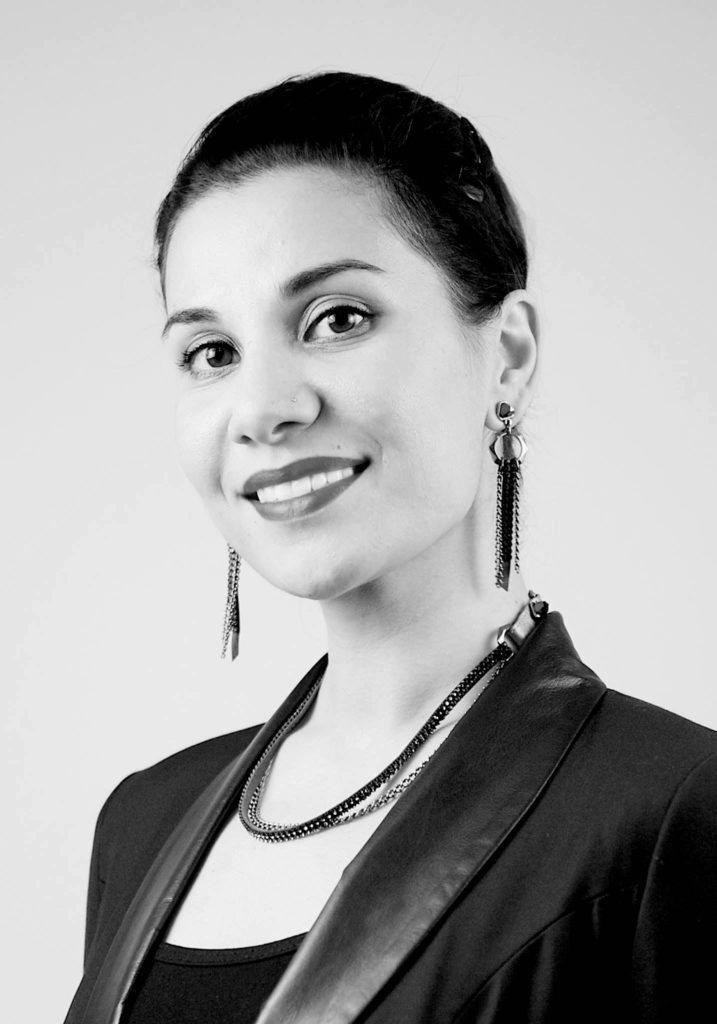 Headshot of Rada Akbar