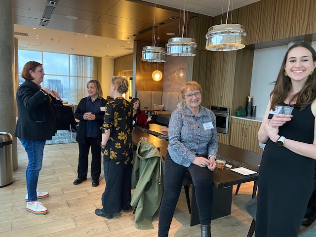 6 women chat and mingle