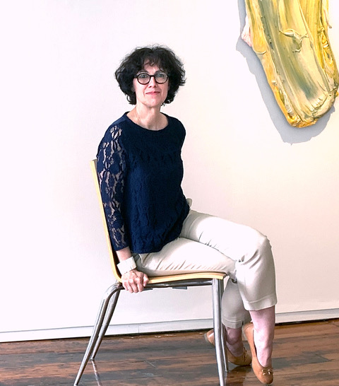 Portrait of Christine Pfister, seated on a chair