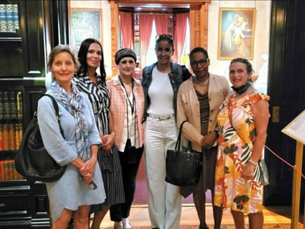 6 women pose for a photo