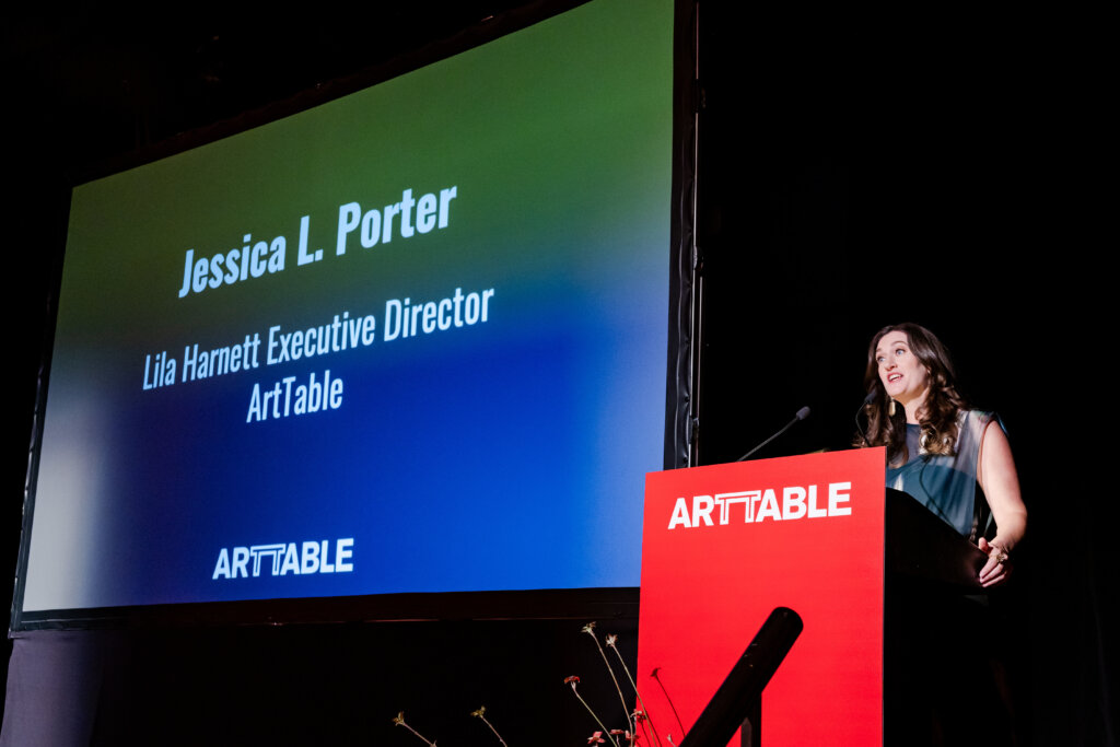 Jessica giving a speech.