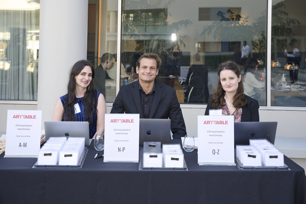 Three staff at the reception.