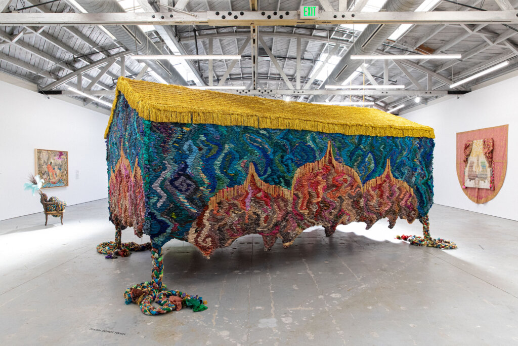 Pappy's house, 2024, vintage saris, fabric, and beaded trim, dimensions variable, photo by Nicholas Lea Bruno, currently on view at the Seattle Asian Art Museum in Mattai's solo she walked in reverse and found my songs
