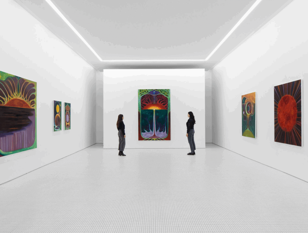 Two people inside an art gallery