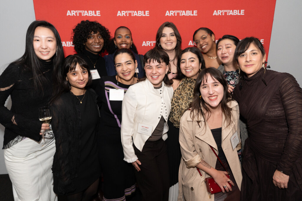 A group of people smiling at the camera
