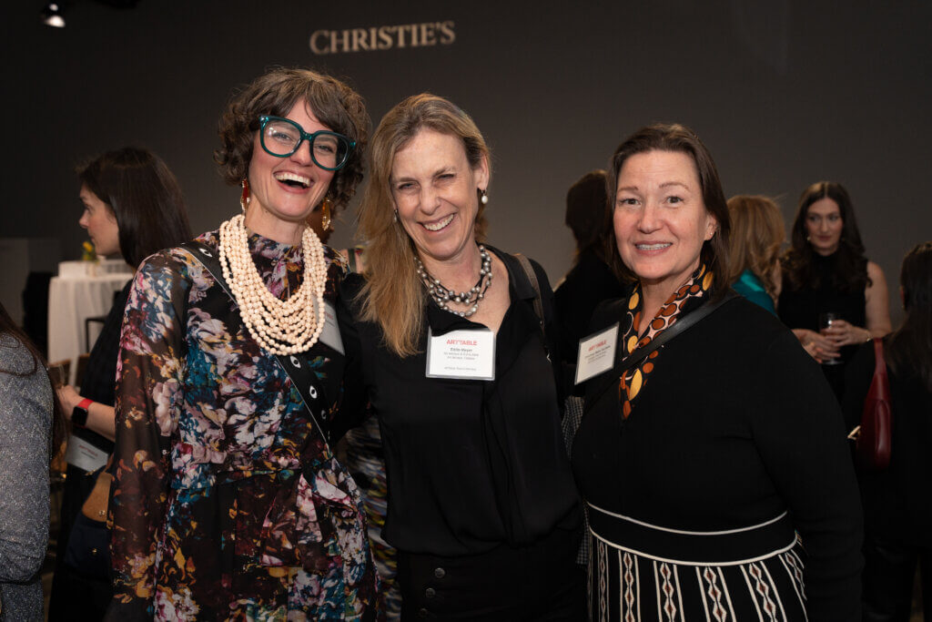 3 women smiling at the camera