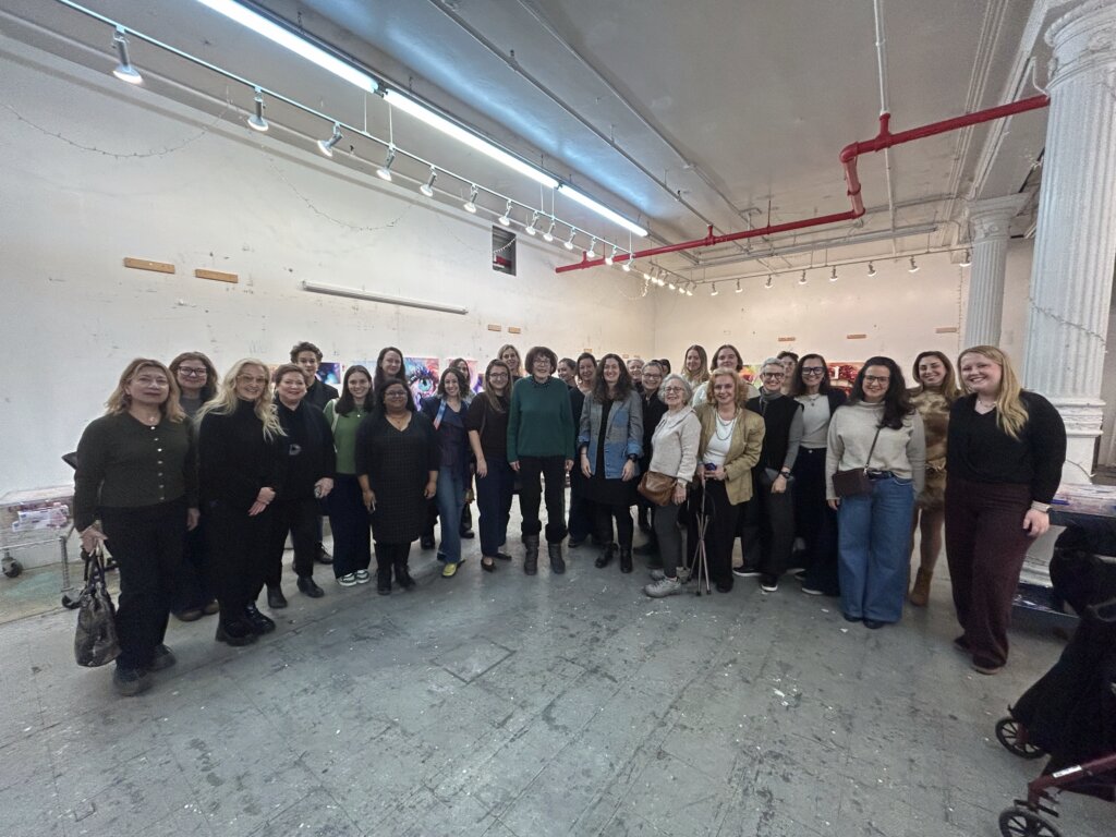 Group shot in Marilyn Minter's studio