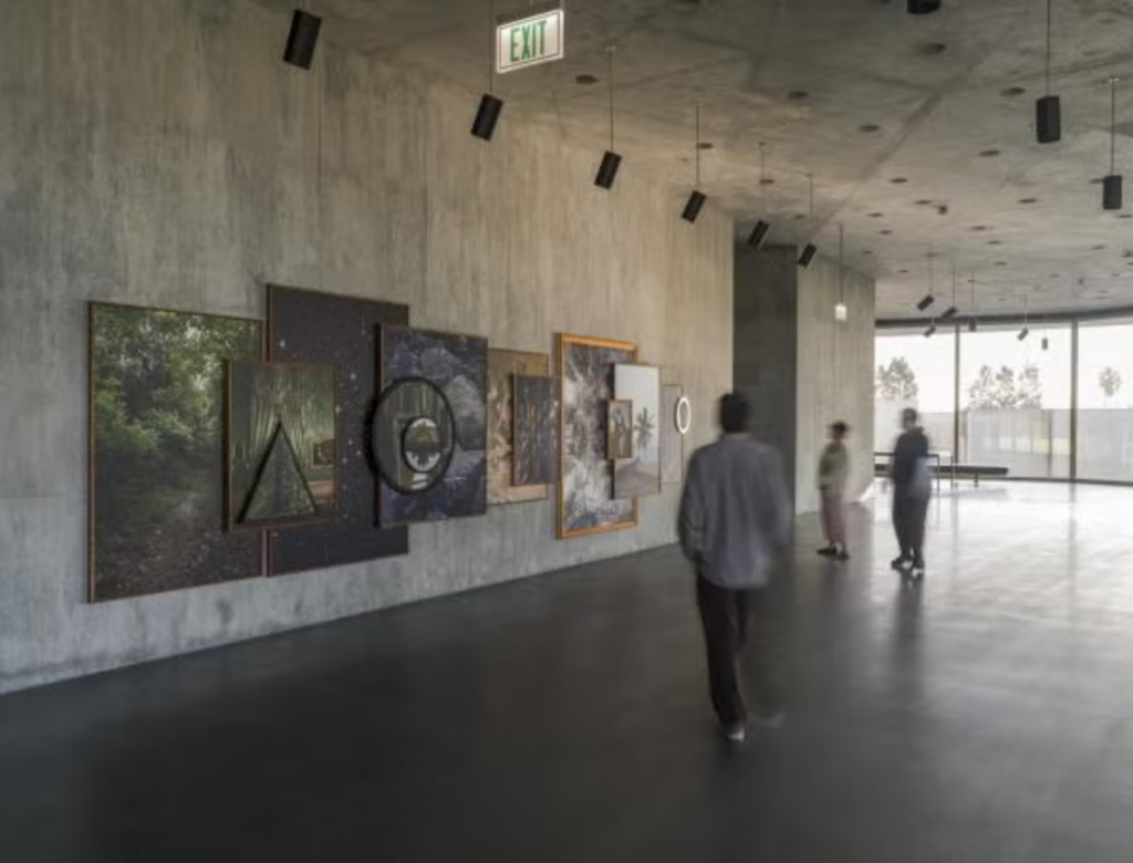 Visitors in the David Geffen Galleries with Todd Gray's Octavia's Gaze, 2025, Los Angeles County Museum of Art, gift of the 2024 Collectors Committee, © Todd Gray, photo © Museum Associates/LACMA, by Jonathan Urban